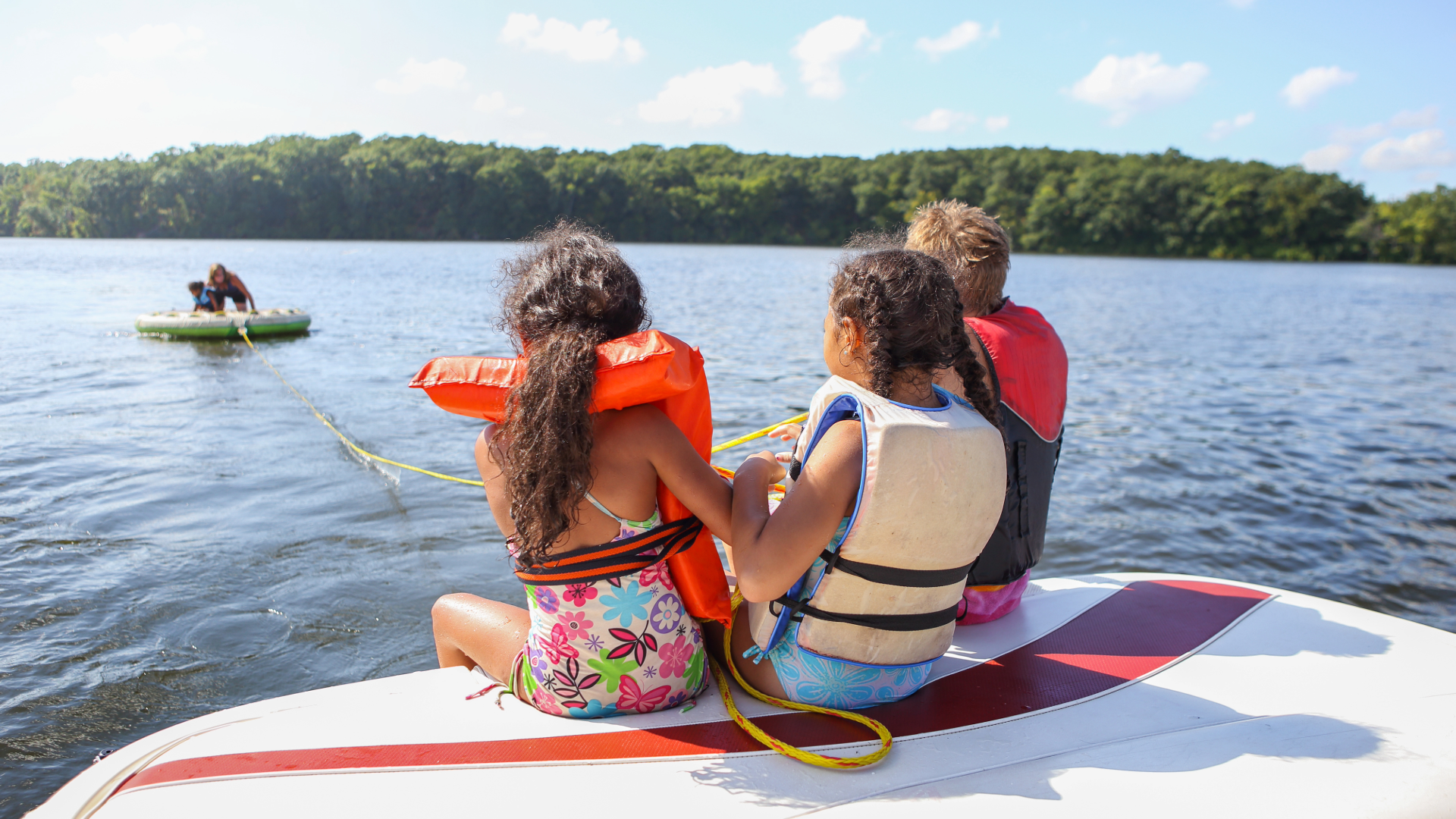 Kids tubing on Missouri Lake